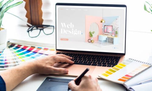 Web design desktop with  laptop and tools